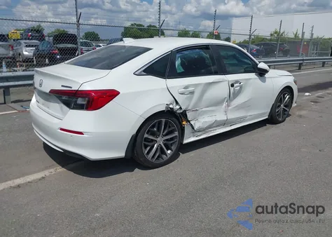 2022 Honda Civic Touring from USA, damaged, VIN 2HGFE1F94NH327982